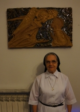 Sister Leopoldina, under a fresco of the Annunciation